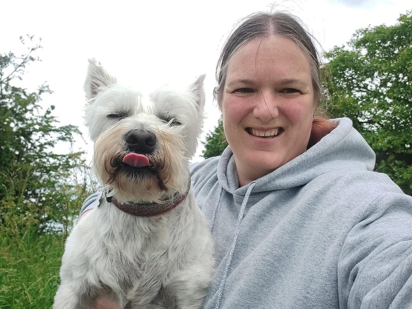 Laura Taylor with a happy westie
